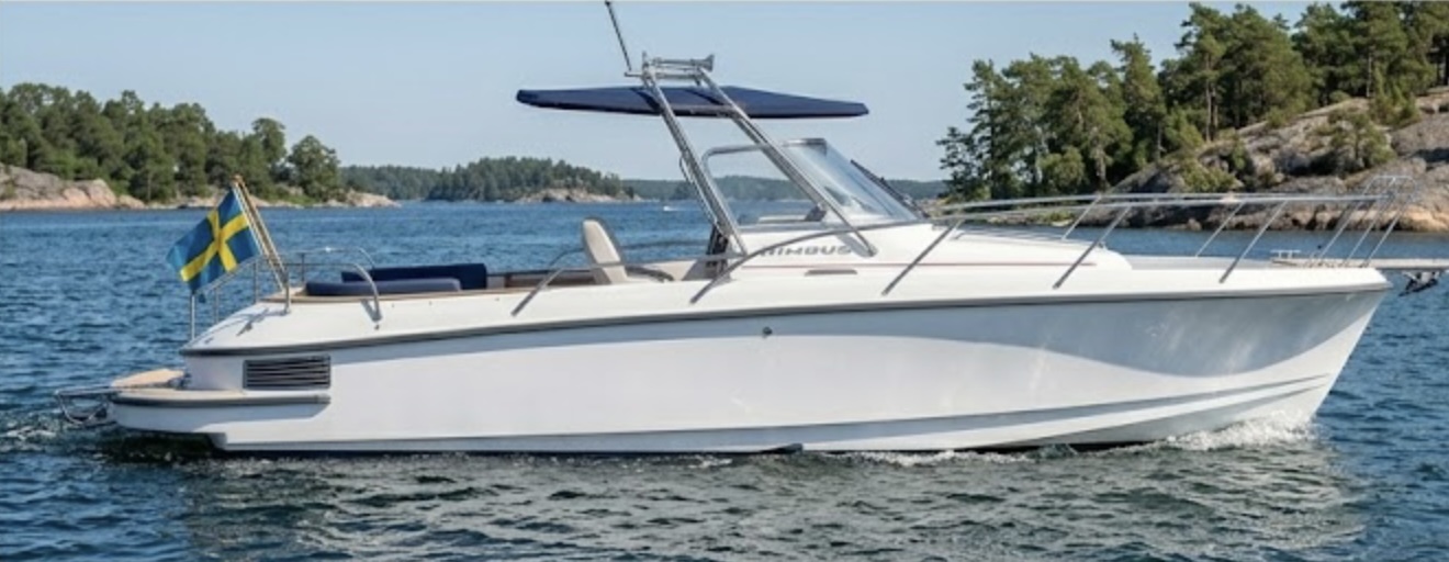 White motorboat with a Swedish flag anchored in the archipelago